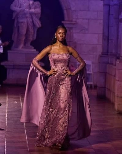 Glamorous royal purple dress at night for an Instagram fashion post